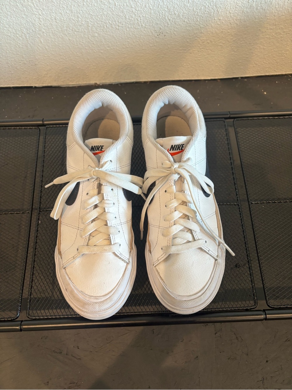 Nike White Low-Top Women's Sneakers with Black Swoosh